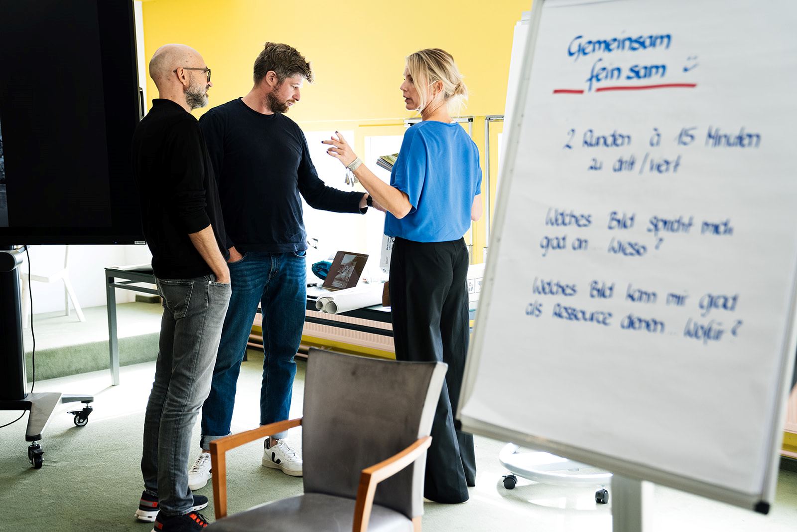Drei ComTeam Berater unterhalten sich